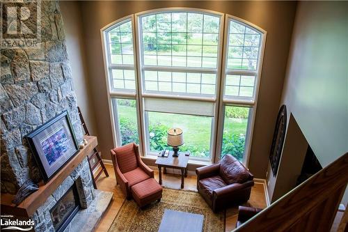 3876 Muskoka Road 118 Unit# Sandfield 2 Week 10, Port Carling, ON - Indoor With Fireplace