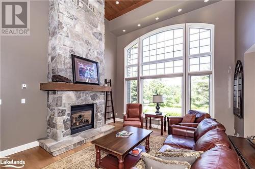 3876 Muskoka Road 118 Unit# Sandfield 2 Week 10, Port Carling, ON - Indoor Photo Showing Living Room With Fireplace