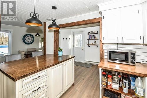 28 Rue Des Chasseurs, Le Goulet, NB - Indoor Photo Showing Kitchen With Fireplace
