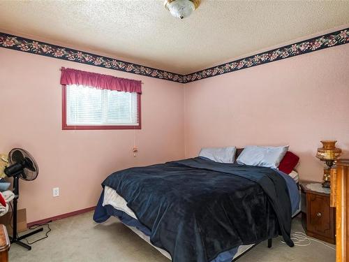 7965 Beaver Creek Rd, Port Alberni, BC - Indoor Photo Showing Bedroom
