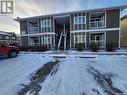 4 485 1St Street Nw, Weyburn, SK  - Outdoor With Balcony With Facade 