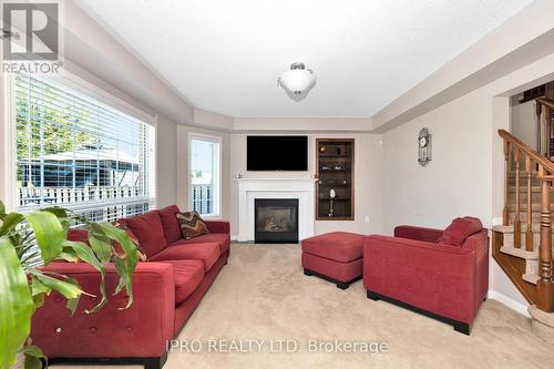 11 Bonavista Drive, Brampton, ON - Indoor Photo Showing Living Room With Fireplace