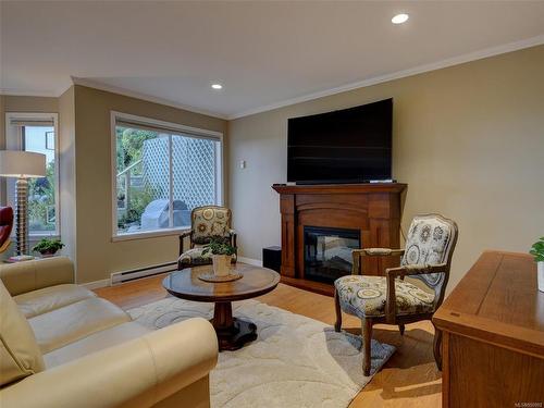 3717 Marine Vista, Cobble Hill, BC - Indoor Photo Showing Living Room With Fireplace