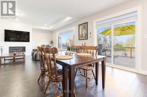 2A Victoria St E, Innisfil, ON - Indoor Photo Showing Dining Room With Fireplace