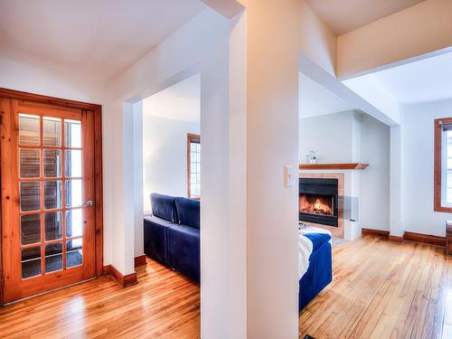 Room - 379 Av. Clément, Dorval, QC - Indoor With Fireplace