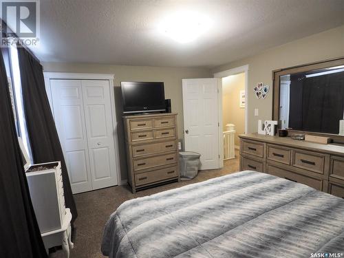 116 4Th Avenue W, Kindersley, SK - Indoor Photo Showing Bedroom