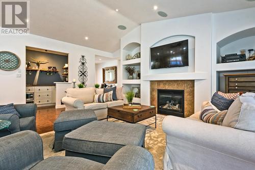 3802 Cypress Hills Drive, Osoyoos, BC - Indoor Photo Showing Living Room With Fireplace