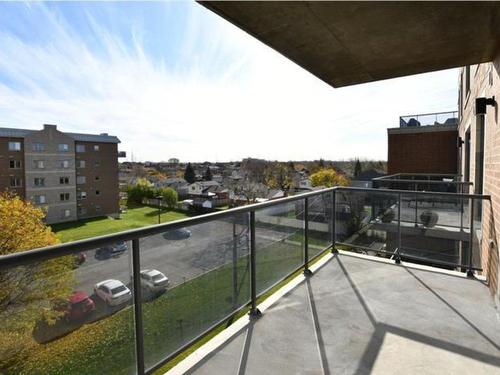 Balcon - 408-4060 Boul. Des Sources, Dollard-Des-Ormeaux, QC - Outdoor With View With Exterior