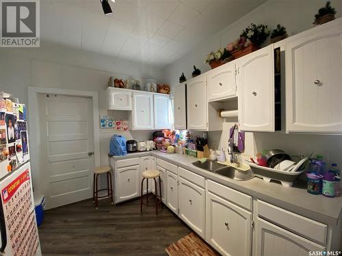 205 B 3Rd Avenue E, Kindersley, SK - Indoor Photo Showing Kitchen With Double Sink
