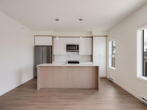202-9716 Third St, Sidney, BC - Indoor Photo Showing Kitchen With Upgraded Kitchen