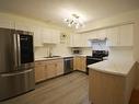 103-310 Rigsby Street, Penticton, BC  - Indoor Photo Showing Kitchen With Double Sink 