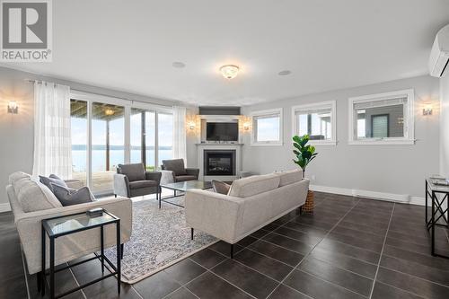 8 Oceans Edge, Portugal Cove-St Philips, NL - Indoor Photo Showing Living Room With Fireplace