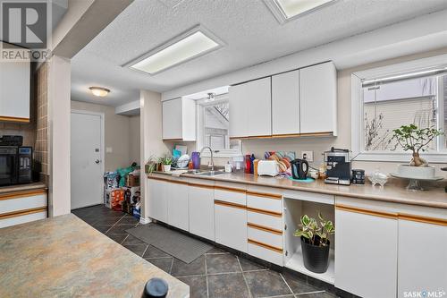 547 19Th Street W, Prince Albert, SK - Indoor Photo Showing Kitchen With Double Sink