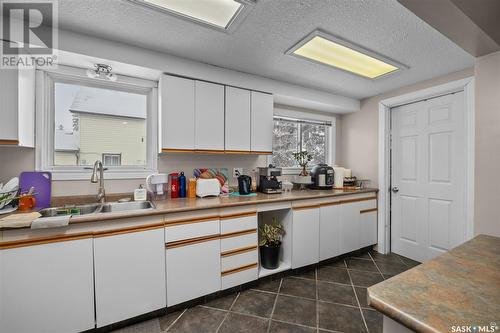 547 19Th Street W, Prince Albert, SK - Indoor Photo Showing Kitchen With Double Sink