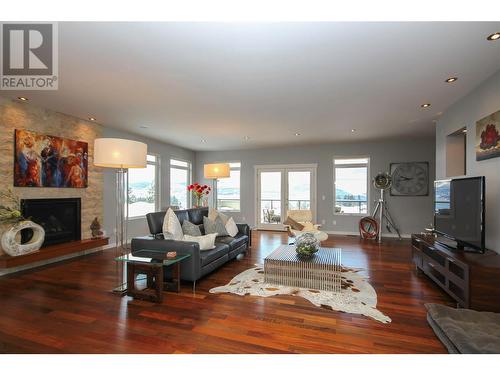 367 Trumpeter Court, Kelowna, BC - Indoor Photo Showing Living Room With Fireplace