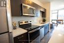 #111 -690 King St W, Kitchener, ON  - Indoor Photo Showing Kitchen With Stainless Steel Kitchen With Double Sink 