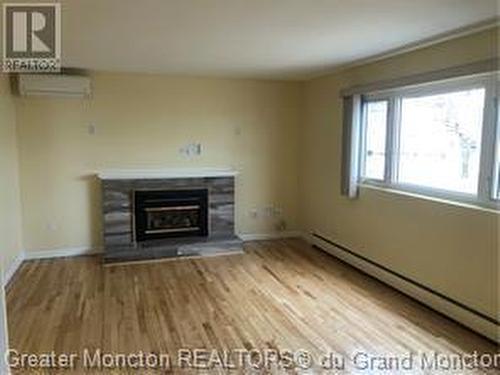 32-34 Century Dr, Moncton, NB - Indoor Photo Showing Living Room With Fireplace