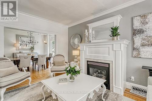 2285 Lakeshore Rd, Burlington, ON - Indoor Photo Showing Living Room With Fireplace