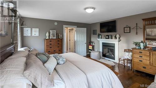 905 Fundy Drive, Campobello Island, NB - Indoor Photo Showing Bedroom With Fireplace