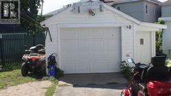 Garage being used by 2 Bedroom Unit - 