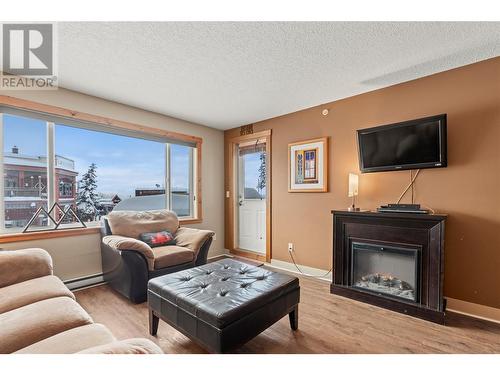 139 Main Street Unit# 225, Silver Star, BC - Indoor Photo Showing Living Room With Fireplace