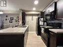 1116 5500 Mitchinson Way, Regina, SK  - Indoor Photo Showing Kitchen With Double Sink 