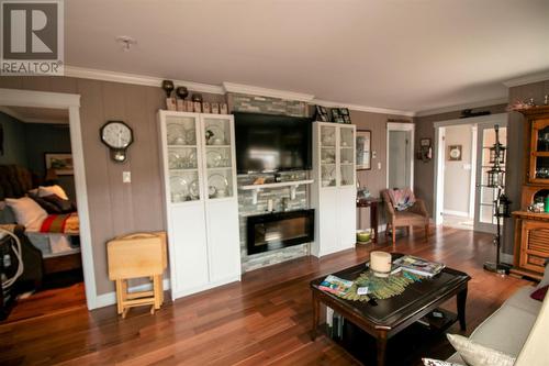 87 Main Street, Fogo, NL - Indoor Photo Showing Living Room With Fireplace