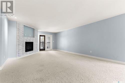 27 Federal Drive, White City, SK - Indoor With Fireplace