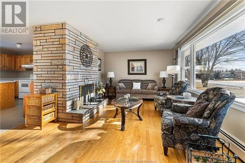 2300 Acadie Rd, Cap Pele, NB - Indoor Photo Showing Living Room With Fireplace