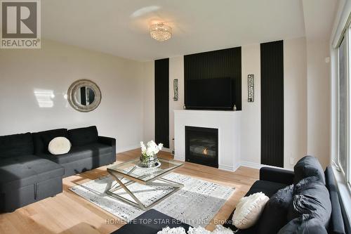 94 Kirby Ave, Collingwood, ON - Indoor Photo Showing Living Room With Fireplace