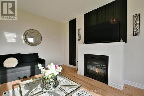 94 Kirby Ave, Collingwood, ON - Indoor Photo Showing Living Room With Fireplace