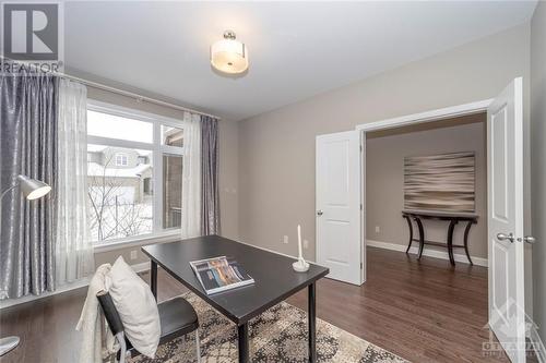Main level home office/den offers possibilities for a private living room, a music room, or another guest suite if desired! - 268 Huntsville Drive, Ottawa, ON - Indoor Photo Showing Office