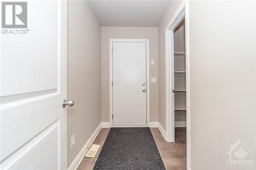 The mud room leads to the 2 car garage as well as the walk-in pantry that could easily be transformed into a walk-in closet - 268 Huntsville Drive, Ottawa, ON - Indoor Photo Showing Other Room