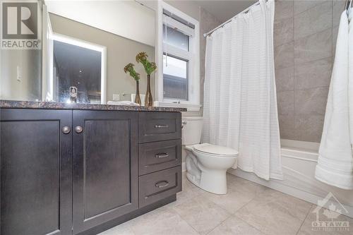 Main bathroom on second level provides all the space a large family needs. - 268 Huntsville Drive, Ottawa, ON - Indoor Photo Showing Bathroom