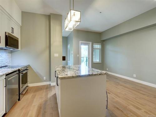 108-1395 Bear Mountain Pkwy, Langford, BC - Indoor Photo Showing Kitchen With Upgraded Kitchen