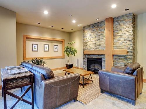 108-1395 Bear Mountain Pkwy, Langford, BC - Indoor With Fireplace