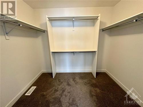 huge primary bedroom Walk-in closet - 82 Bon Temps Way, Ottawa, ON - Indoor With Storage