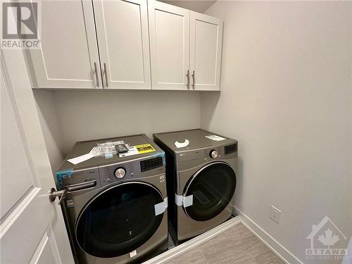 2nd floor laundry with new washer/dryer - 82 Bon Temps Way, Ottawa, ON - Indoor Photo Showing Laundry Room