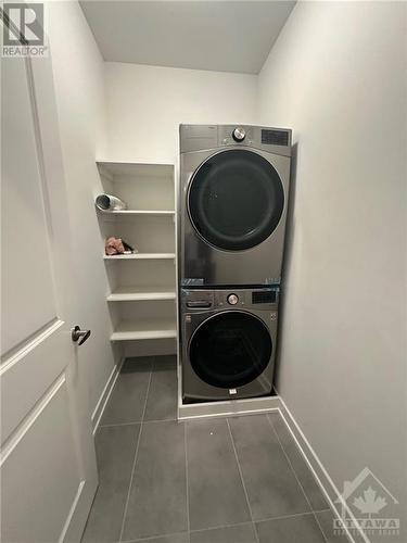 main level laundry - 563 Knotridge Street, Ottawa, ON - Indoor Photo Showing Laundry Room