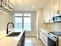 #309 -17 Cleave Ave, Prince Edward County, ON  - Indoor Photo Showing Kitchen With Upgraded Kitchen 