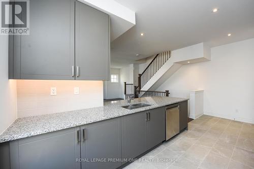 60 - 40 Lunar Crescent, Mississauga, ON - Indoor Photo Showing Kitchen With Double Sink