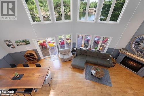 Great Room view from Loft - 4406 Conners Bay Lane, Severn, ON - Indoor Photo Showing Other Room With Fireplace