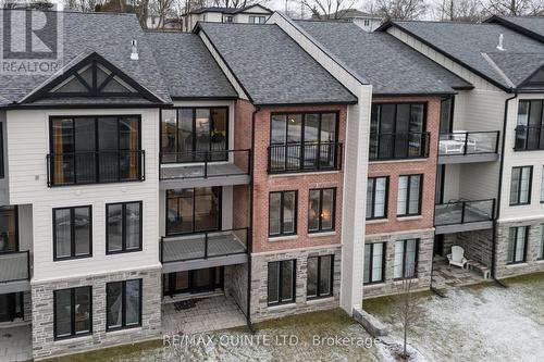 51 Bentley Cres, Prince Edward County, ON - Outdoor With Balcony With Facade