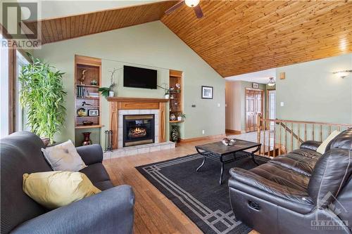13243 Thompson Road, Winchester, ON - Indoor Photo Showing Living Room With Fireplace