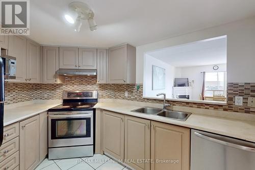 #315 -160 Wellington St E, Aurora, ON - Indoor Photo Showing Kitchen With Stainless Steel Kitchen With Double Sink