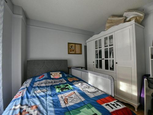 Chambre Ã Â coucher - 202-3430 Boul. Le Carrefour, Laval (Chomedey), QC - Indoor Photo Showing Bedroom