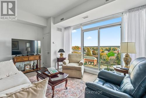 #605 -109 King Ave E, Clarington, ON - Indoor Photo Showing Living Room With Fireplace