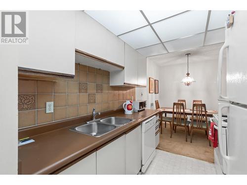 1056 Bernard Avenue Unit# 310, Kelowna, BC - Indoor Photo Showing Kitchen With Double Sink