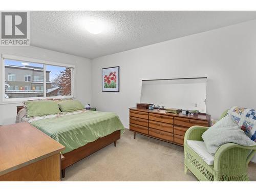 1056 Bernard Avenue Unit# 310, Kelowna, BC - Indoor Photo Showing Bedroom