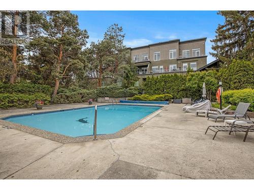 1056 Bernard Avenue Unit# 310, Kelowna, BC - Outdoor With In Ground Pool With Backyard